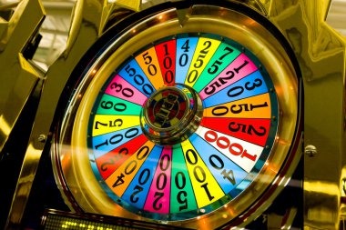 Multi-angle live-dealer studio with four camera feeds showing wheel, layout, croupier, and close-up confirmation